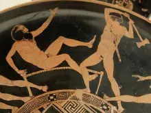 Teseo matando a Procustes, en una cerámica de figuras rojas