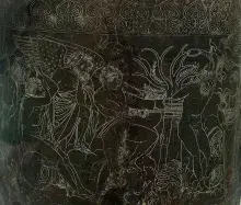 Escena mitológica en una espejo etrusco